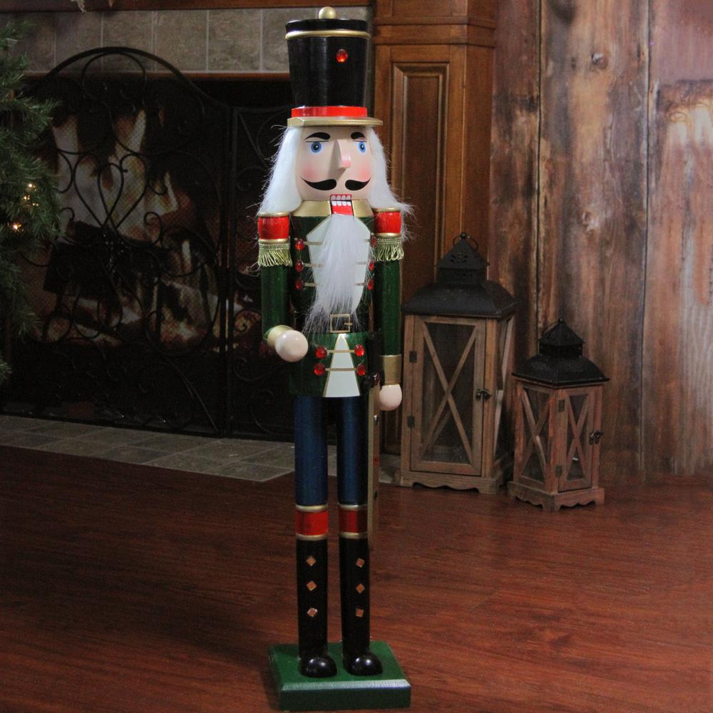 36.75" Green and Black Christmas Nutcracker Soldier with Sword. Picture 4