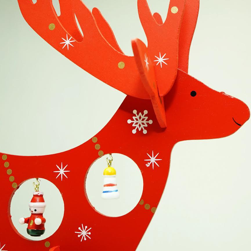 13" Red and White Reindeer Cut-Out Christmas Tabletop Decor. Picture 2