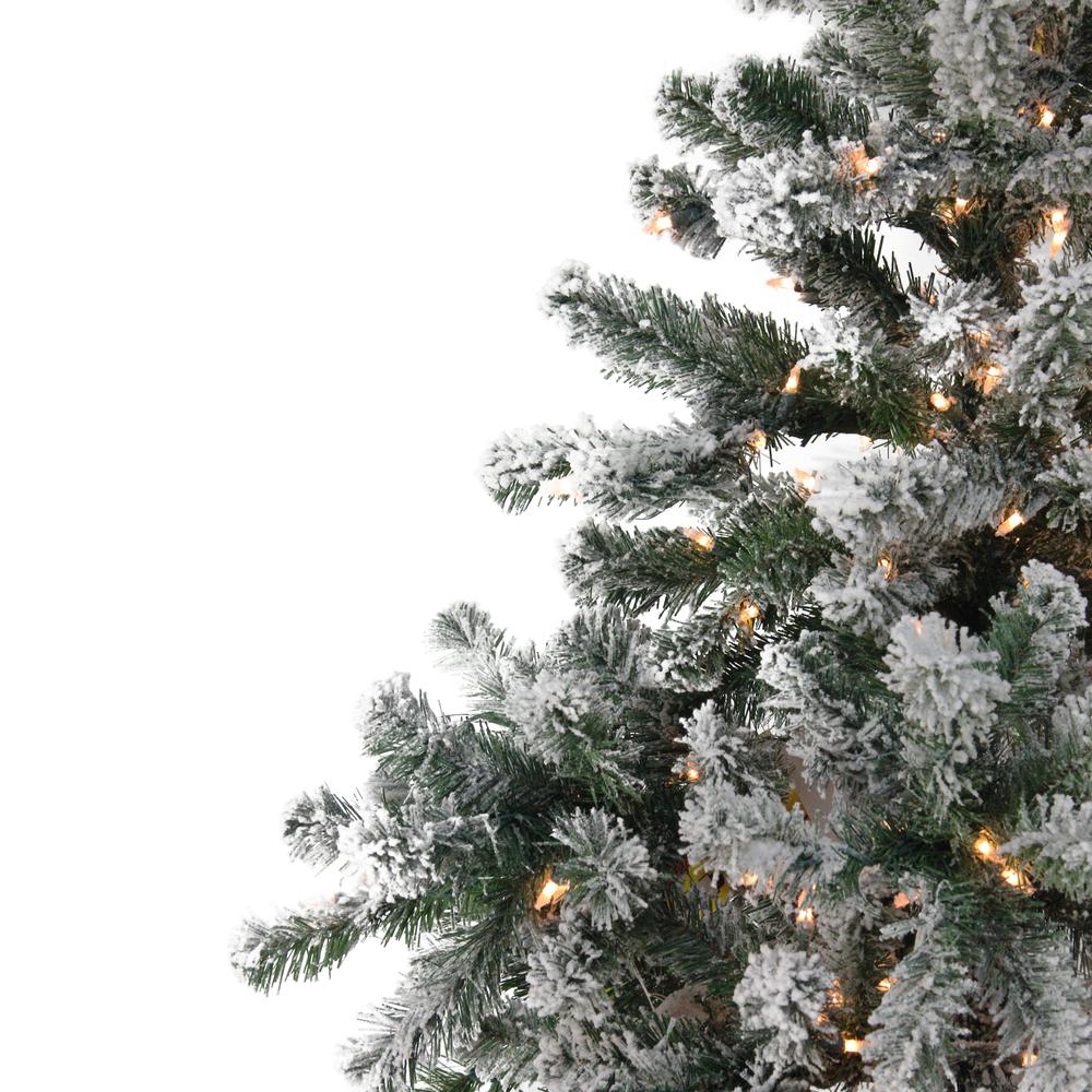 7.5' Pre-Lit Full Flocked Natural Emerald Artificial Christmas Tree - Warm Clear Lights. Picture 3