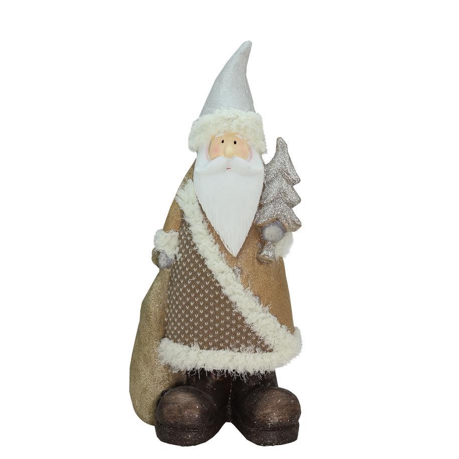 18.5" Brown and White Santa Holding Christmas Tree Tabletop Figurine. Picture 1