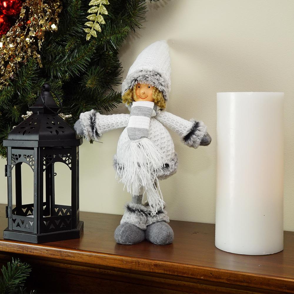 13" Gray and White Wintry Boy Christmas Tabletop Figurine. Picture 3