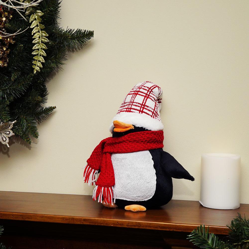 13.75" Black and Red Penguin Wearing a Scarf with Plaid Hat Christmas Tabletop Decoration. Picture 3
