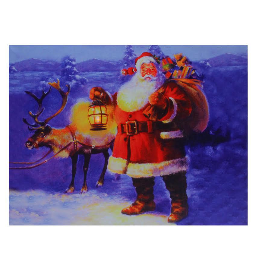LED Lighted Santa Claus with Reindeer Christmas Canvas Wall Art 11.75" x 15.75". Picture 1