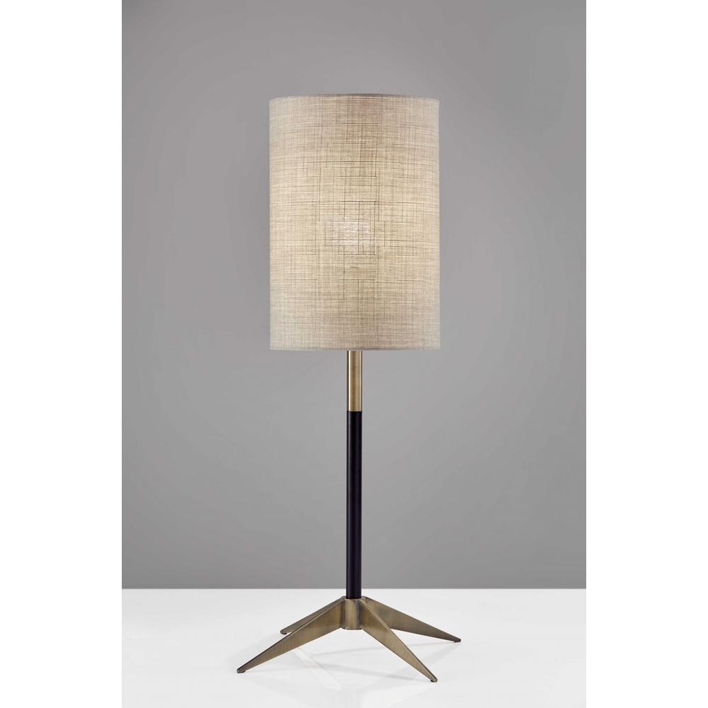 Antique Brass Metal Tripod Base with Matte Black Accent and Tall Natural Fabric Shade Table Lamp - 372592. Picture 1