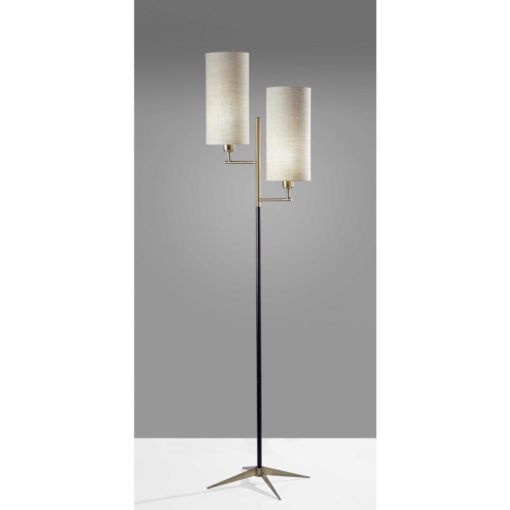Two Light Floor Lamp Antique Brass Metal Tripod Base with Matte Black Accent and Tall Natural Fabric Shade. Picture 1