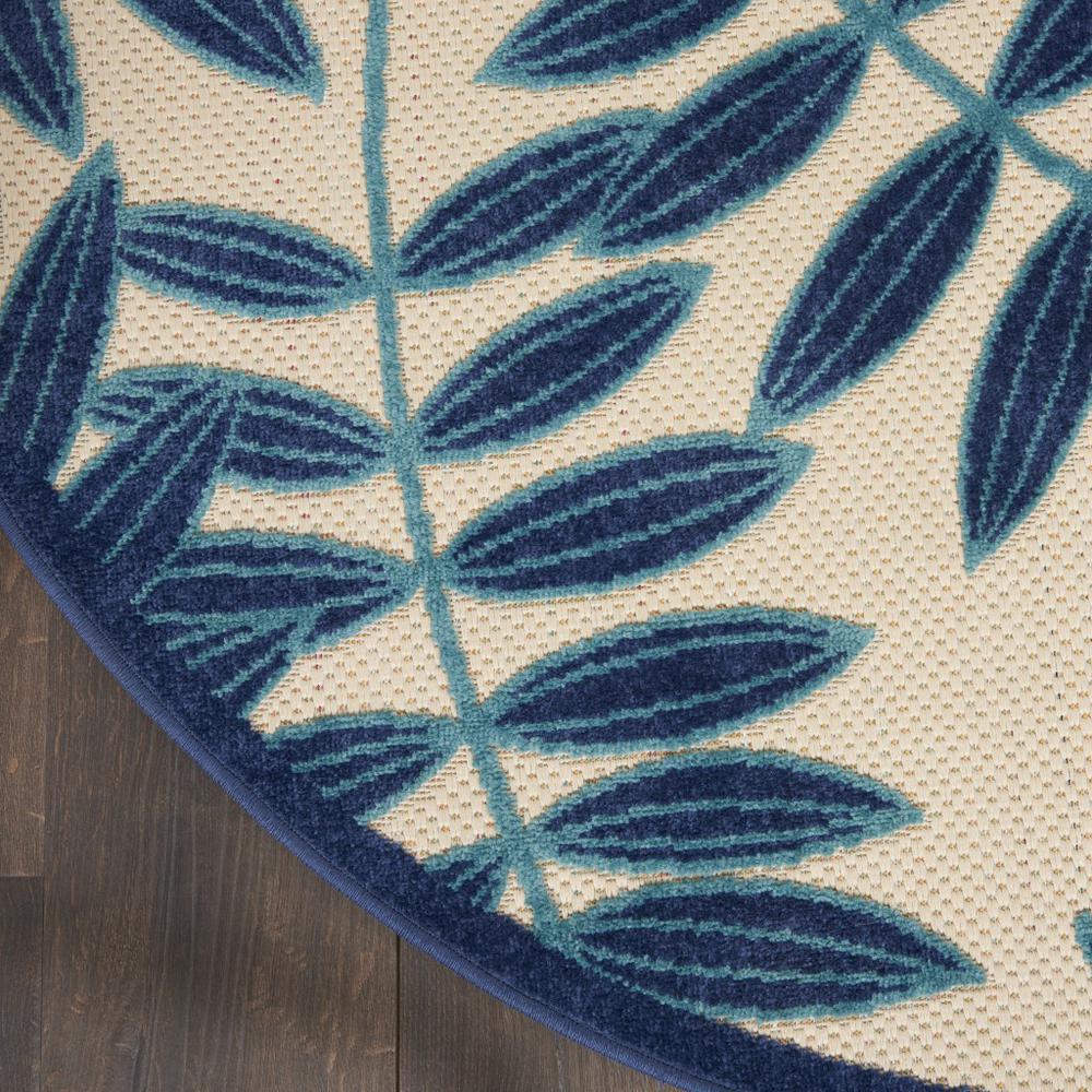 4’ Round Navy and Beige Leaves Indoor Outdoor Area Rug - 385231. Picture 4