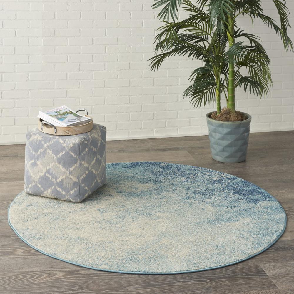 4’ Round Light Blue and Ivory Abstract Sky Area Rug Navy/Light Blue. Picture 6