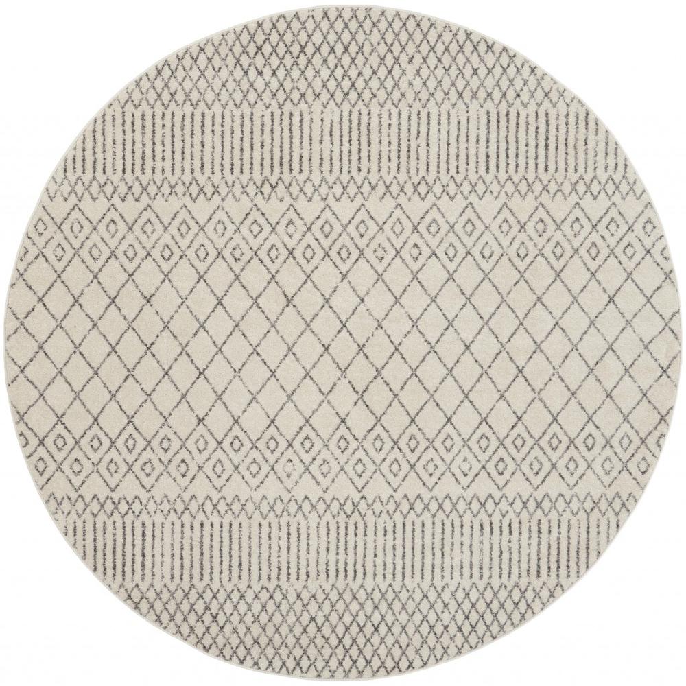8’ Round Ivory and Gray Geometric Area Rug Ivory/Grey. Picture 1