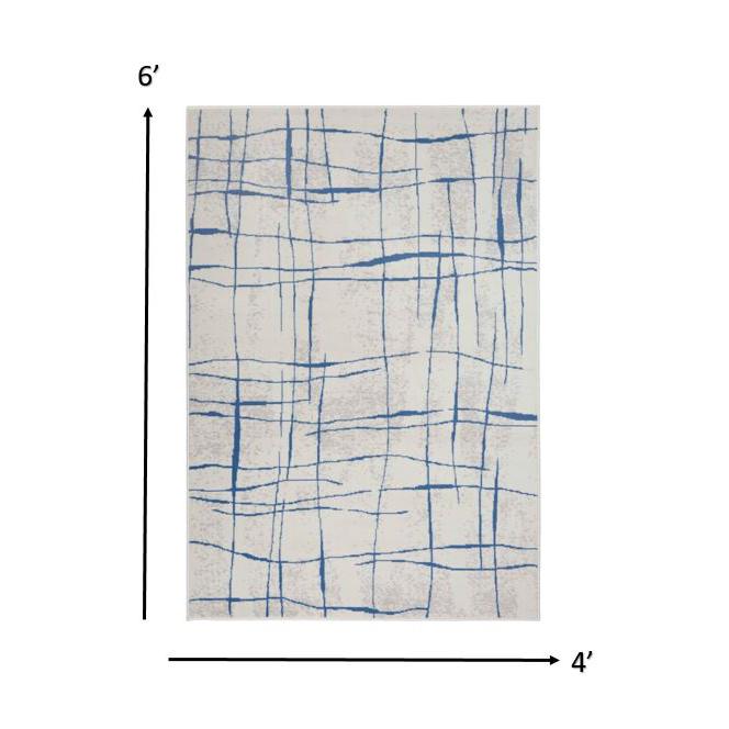 4’ x 6’ Ivory and Blue Irregular Grids Area Rug Ivory Blue. The main picture.