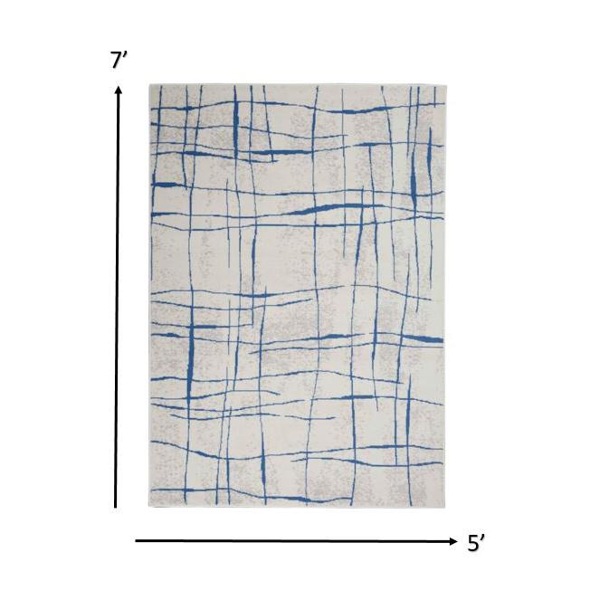 5’ x 7’ Ivory and Blue Irregular Grids Area Rug Ivory Blue. Picture 1