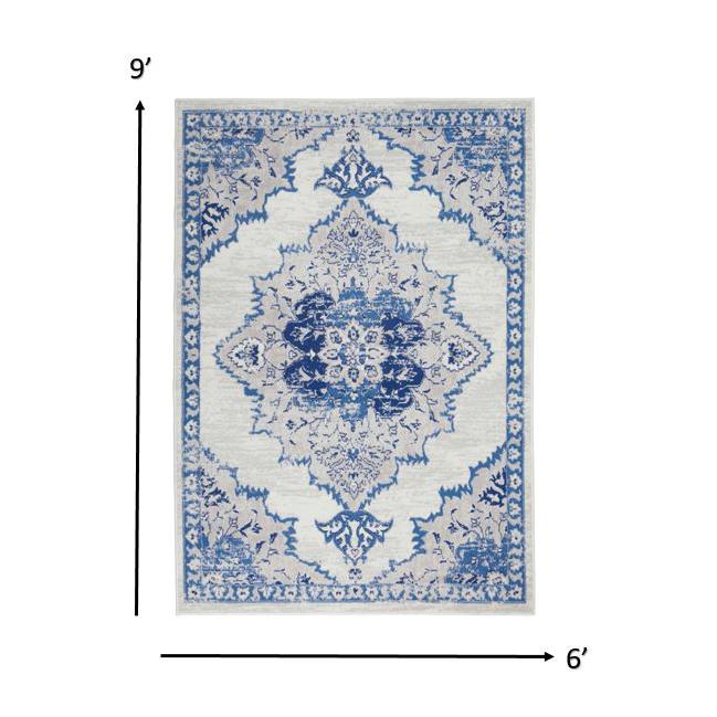 6’ x 9’ Ivory and Blue Medallion Area Rug Ivory Blue. Picture 6