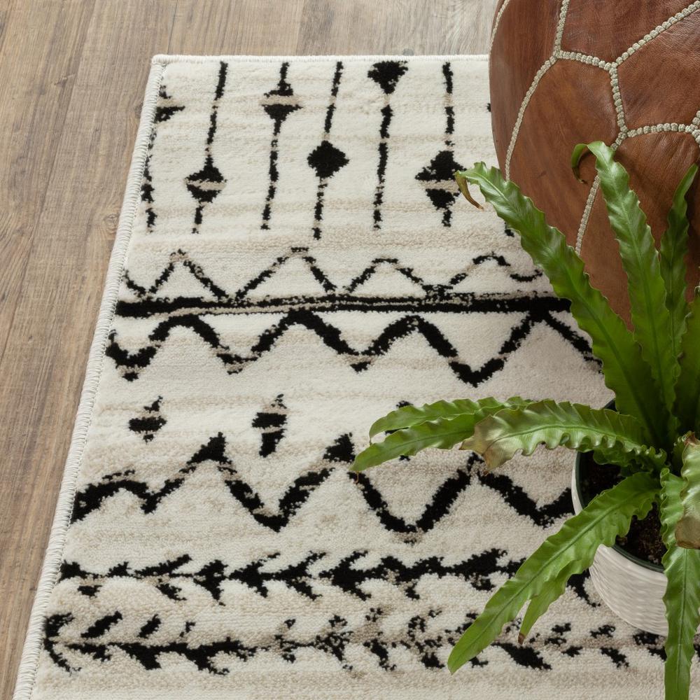 2’ x 8’ Ivory and Black Eclectic Patterns Indoor Runner Rug - 388017. Picture 3