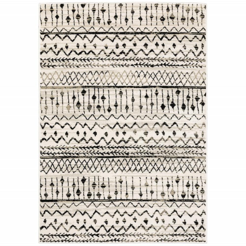 4’ x 6’ Ivory and Black Eclectic Patterns Indoor Area Rug - 388020. Picture 1