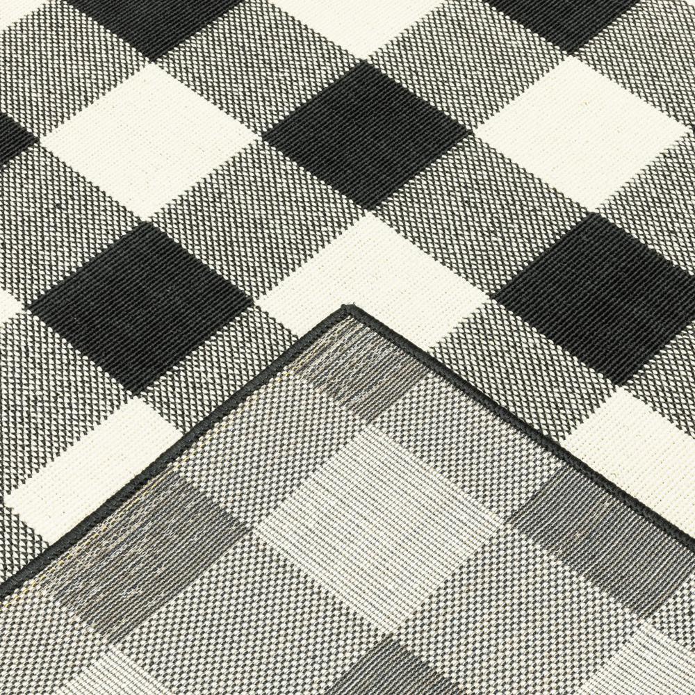 8’ Round Black and Ivory Gingham Indoor Outdoor Area Rug - 389522. Picture 2