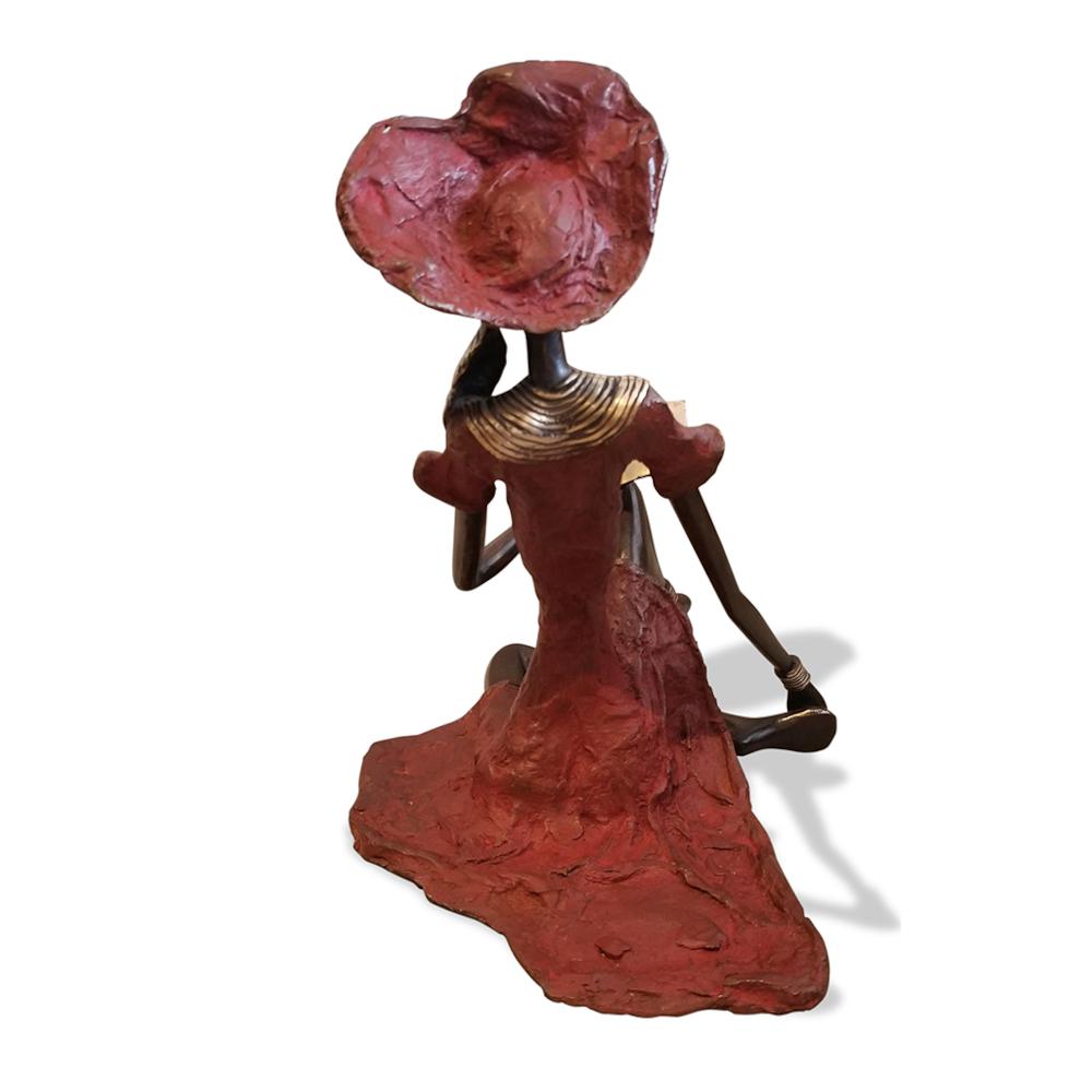 Vintage Bronze Seated West African Woman Reading Sculpture Red. Picture 3