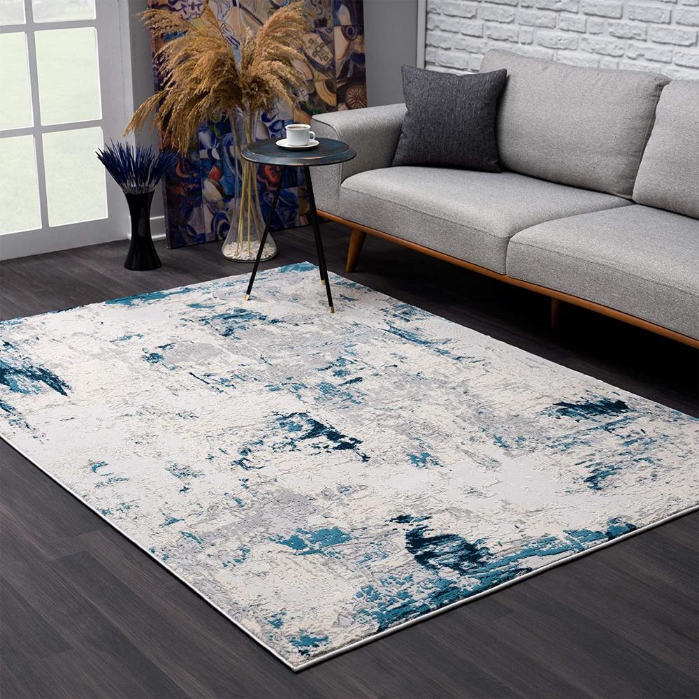 7’ x 10’ Blue and Ivory Abstract Strokes Area Rug Blue. Picture 1