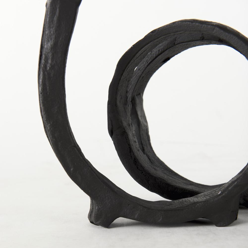 Black Metal Ribbon Loop Sculpture Black. Picture 6