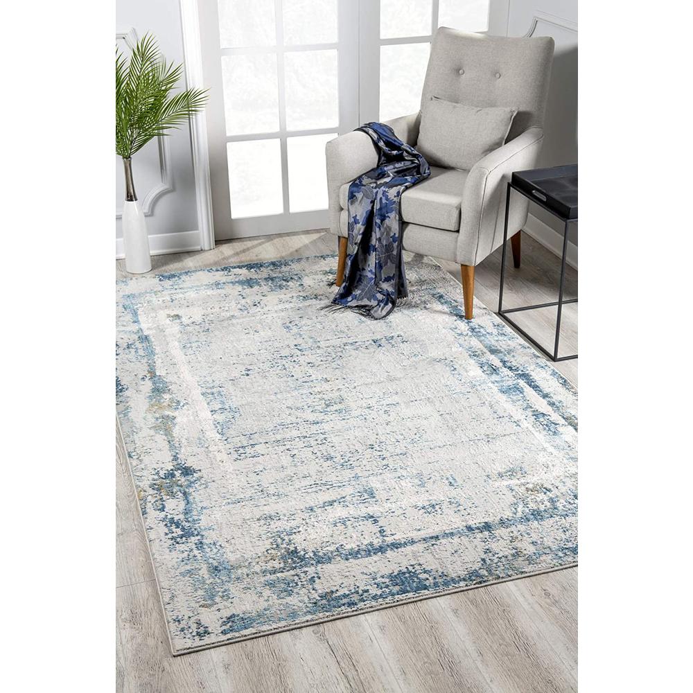 4’ x 6’ Ivory and Blue Abstract Distressed Area Rug Cream Blue. Picture 1