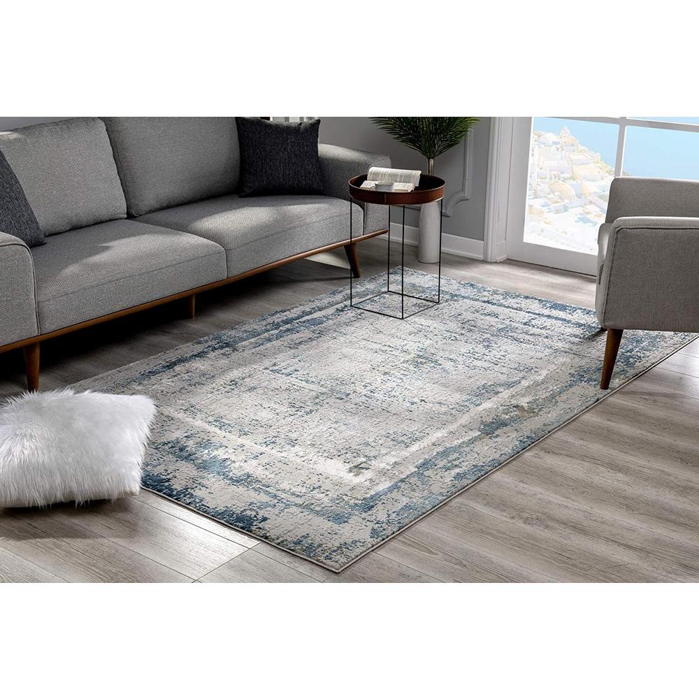 4’ x 6’ Ivory and Blue Abstract Distressed Area Rug Cream Blue. Picture 3
