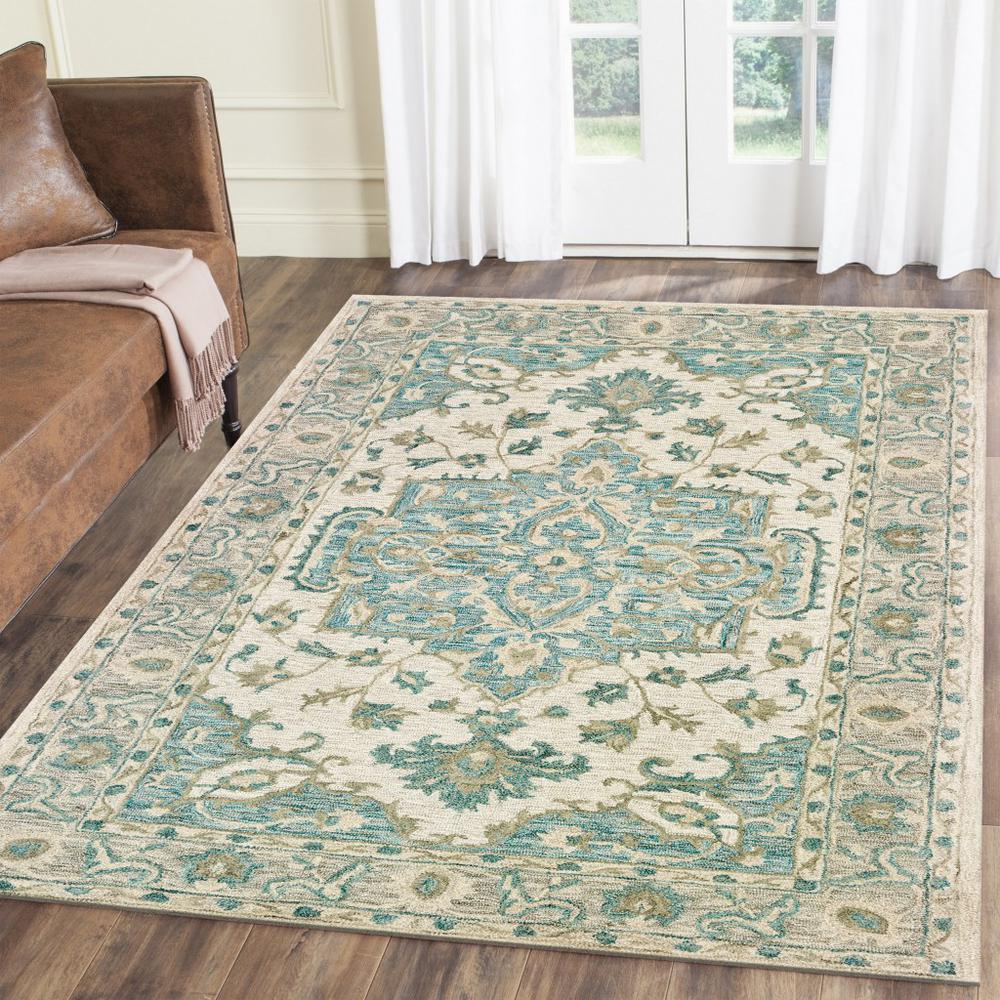 5’ x 8’ Turquoise and Cream Medallion Area Rug Blue/Green/Gray. The main picture.
