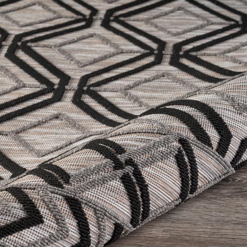 5' X 7' Black And Tan Indoor Outdoor Area Rug. Picture 9
