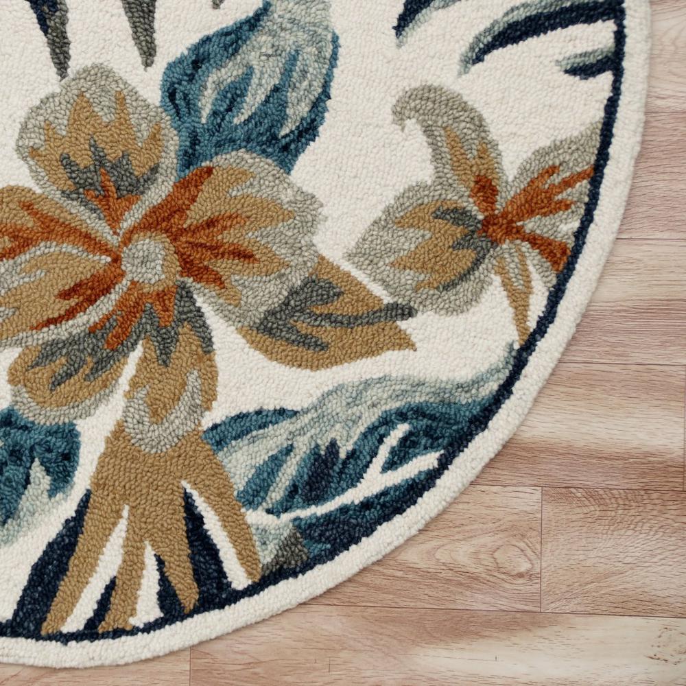 4’ Round Blue and White Tropical Area Rug Multi/White/Blue. Picture 4
