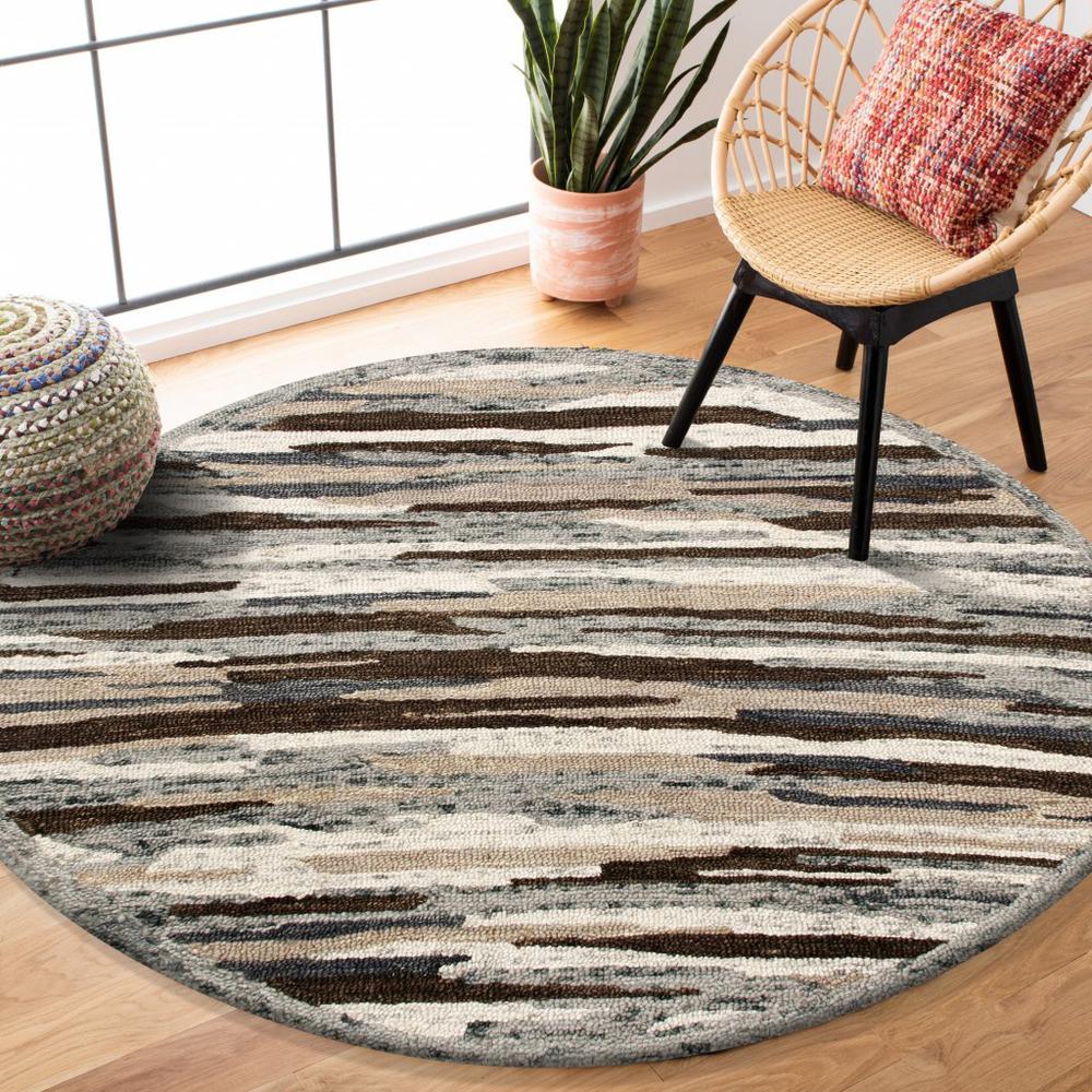 4’ Round Brown and Gray Camouflage Area Rug Multi. Picture 7