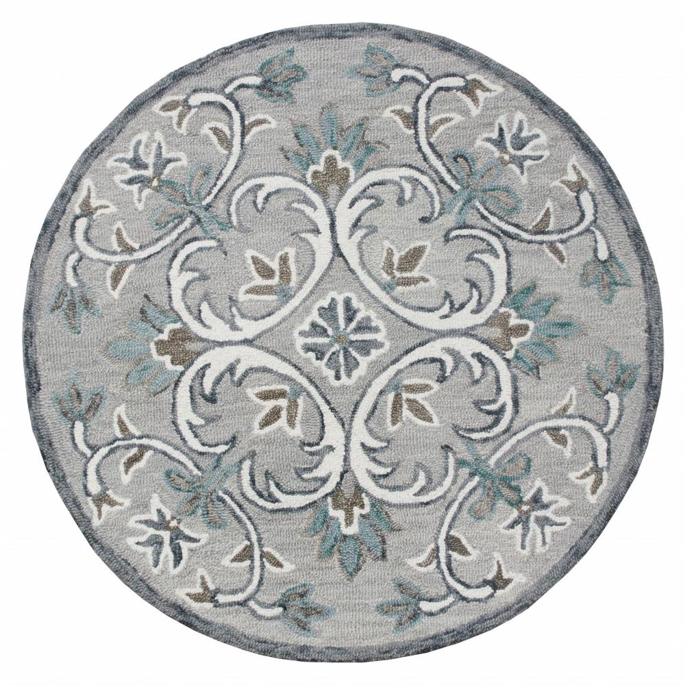 4’ Round Gray and White Filigree Area Rug Taupe/Gray/Blue/White. Picture 1