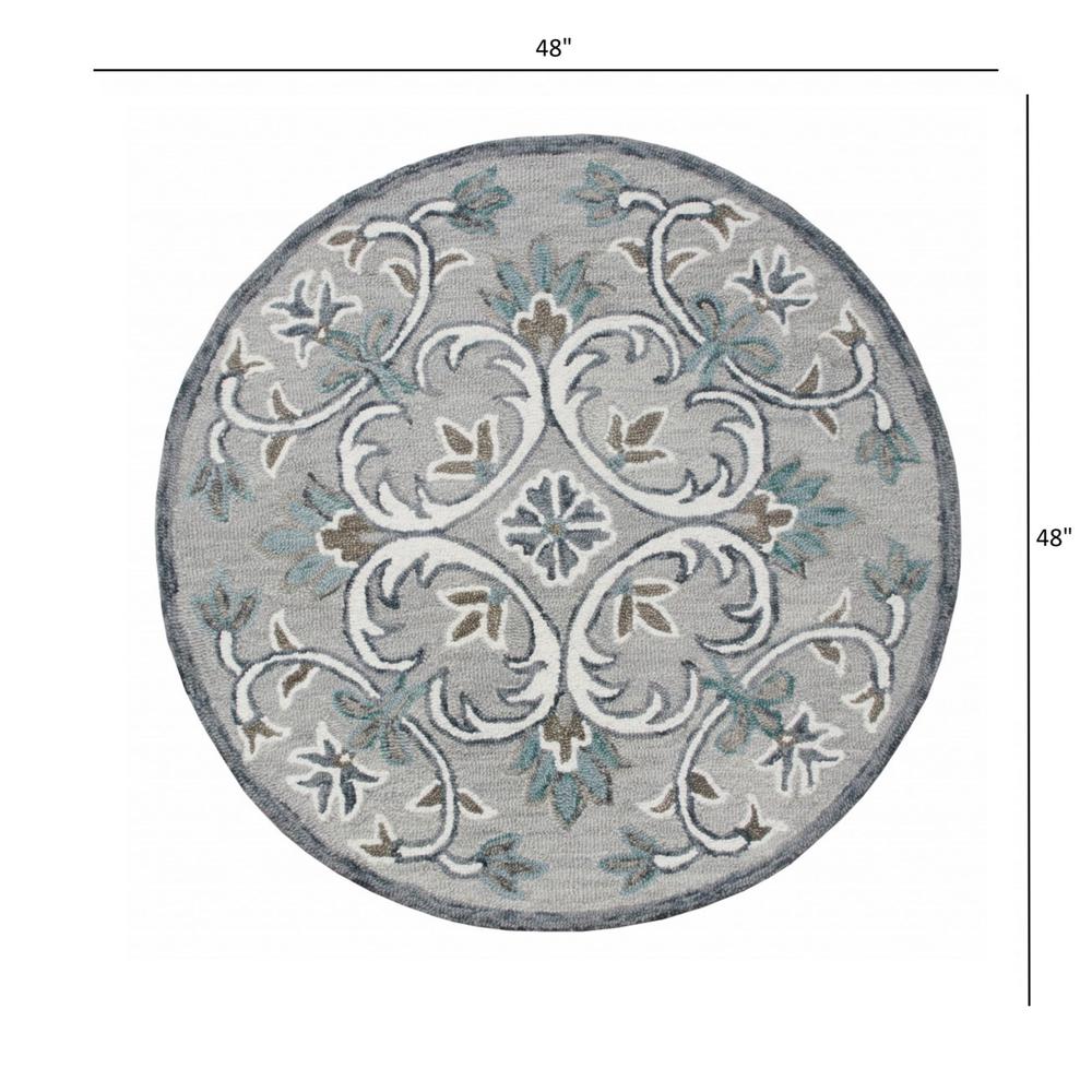 4’ Round Gray and White Filigree Area Rug Taupe/Gray/Blue/White. Picture 8