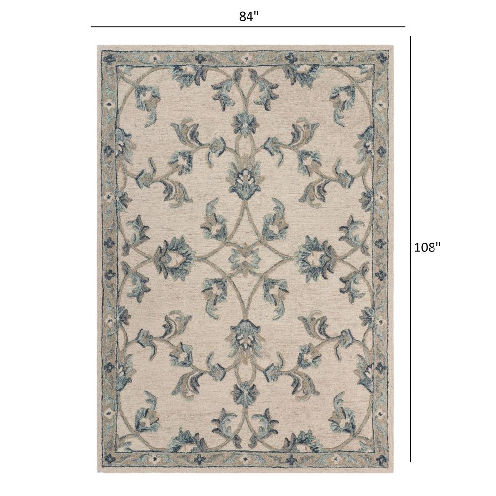 7’ x 9' Beige and Blue Filigree Area Rug Ivory/Light Blue. Picture 8