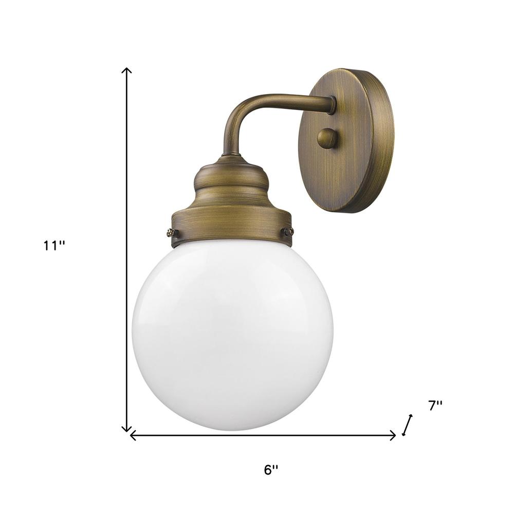 One Light Gold Wall Sconce with Round Glass Shade. Picture 4