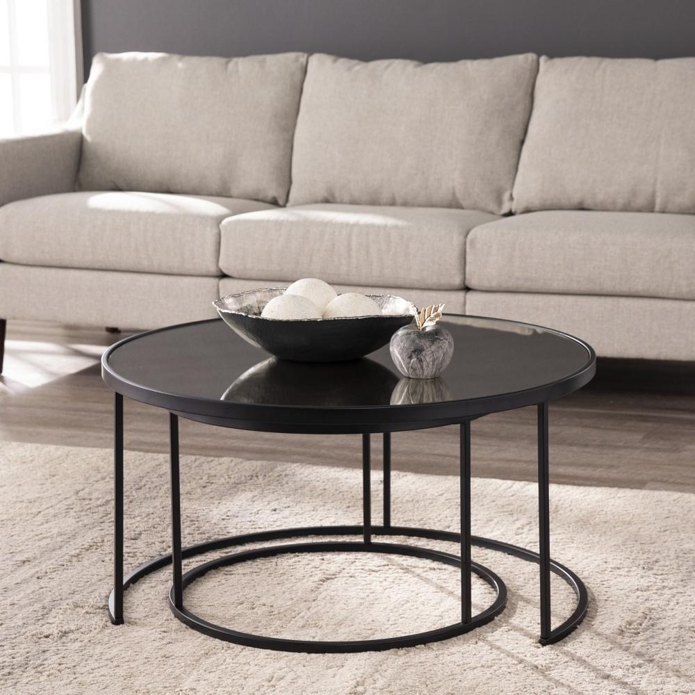 Set of Two Black And Silver Mirrored Round Nested Coffee Table Set. Picture 7