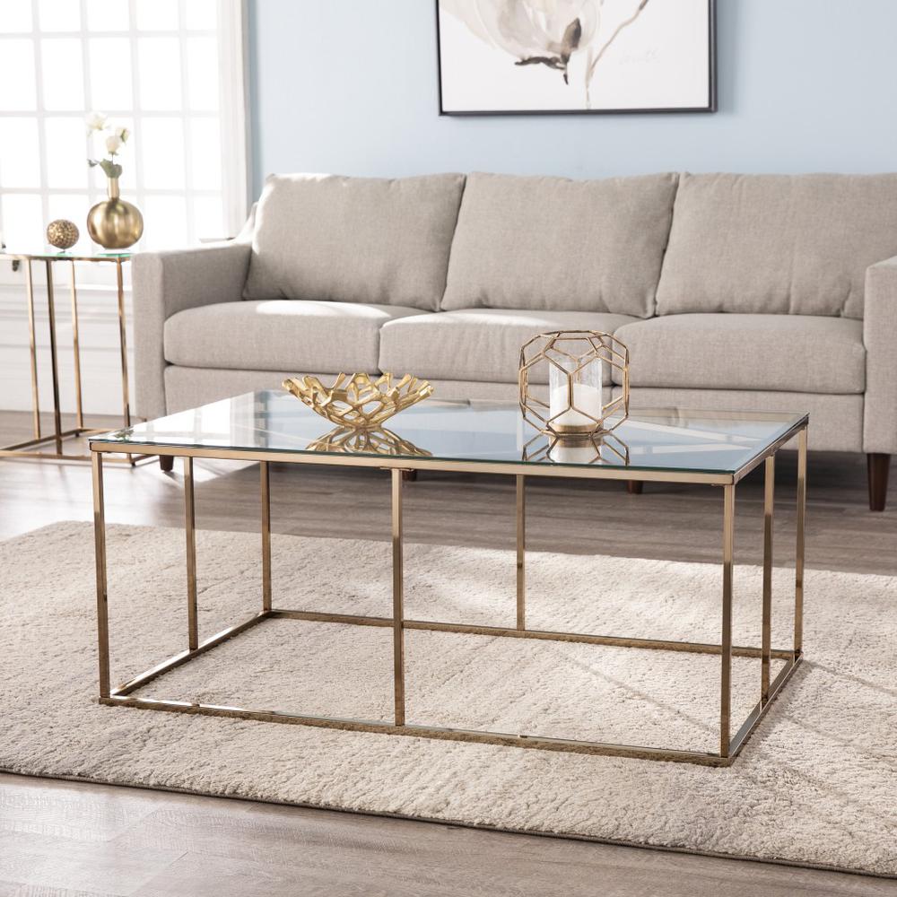 42" Champagne Glass And Metal Geometric Coffee Table. Picture 7