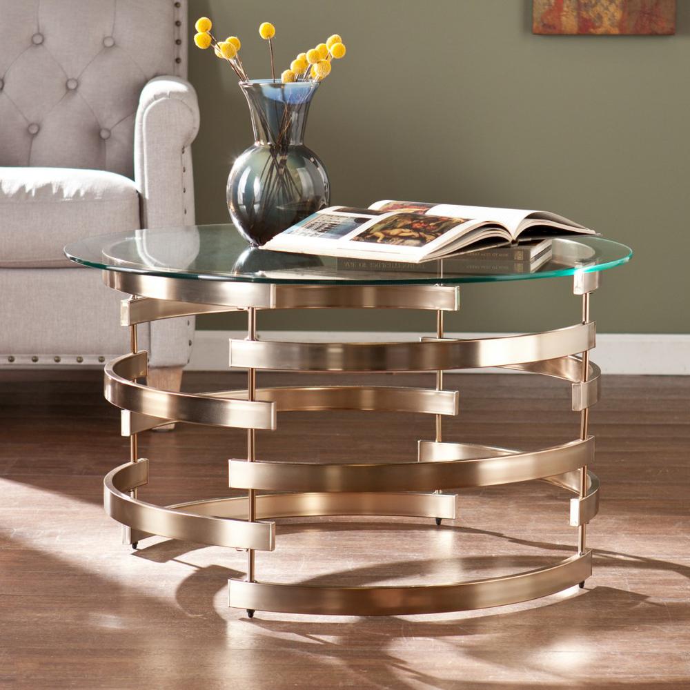 32" Champagne Glass And Metal Round Coffee Table. Picture 1