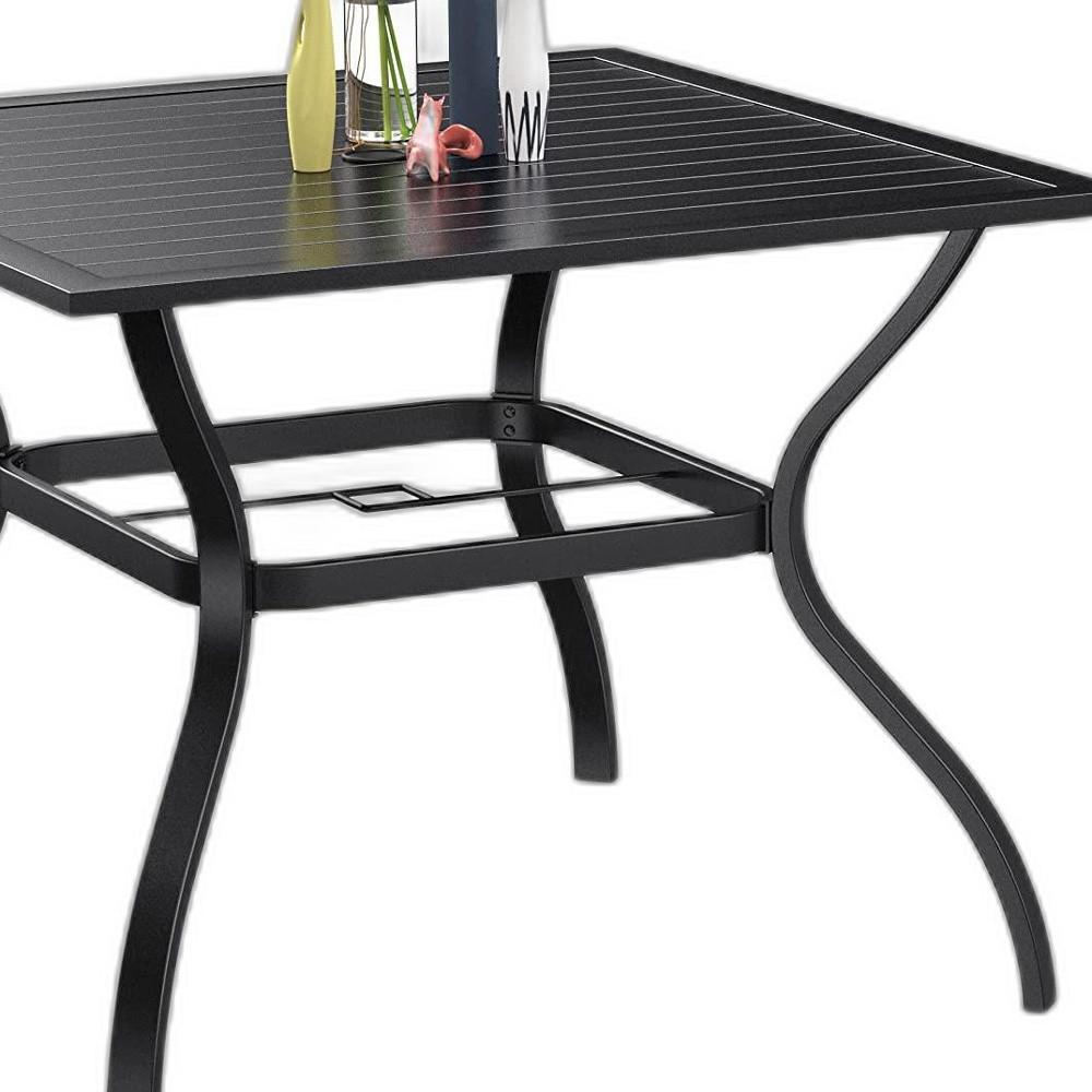 ?Black Square Metal Outdoor Dining Table With Umbrella Hole. Picture 3