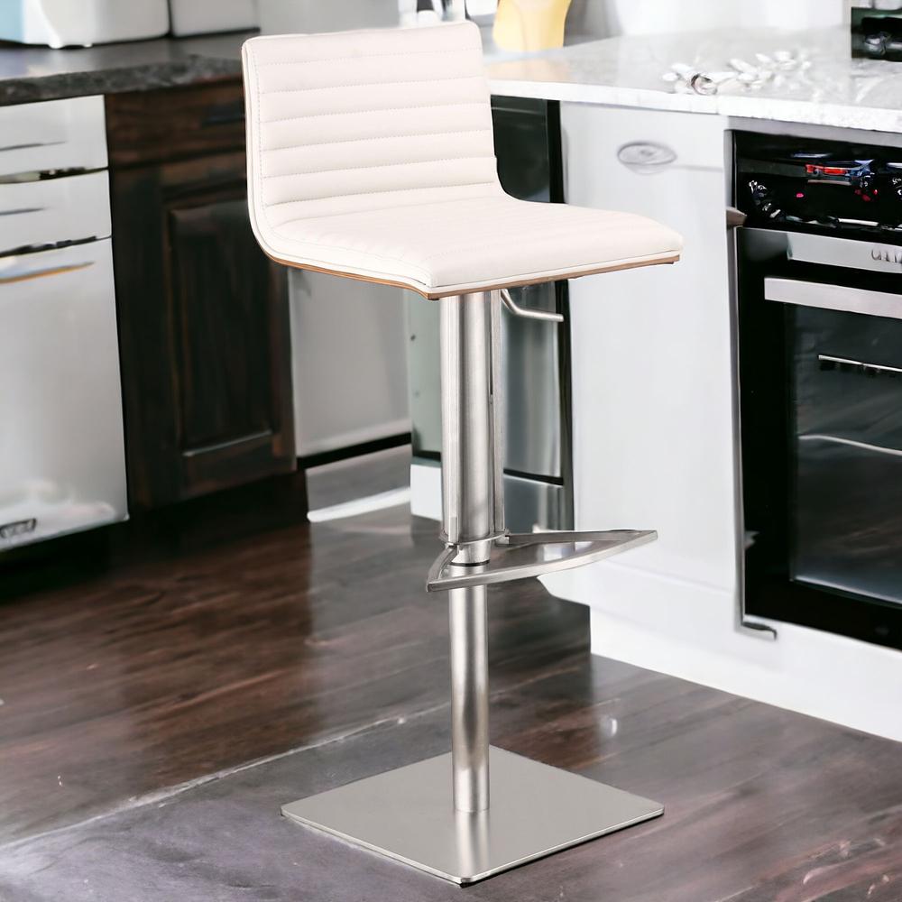 White Faux Leather Armless Swivel Bar Stool with Brushed Stainless Steel Base. Picture 2