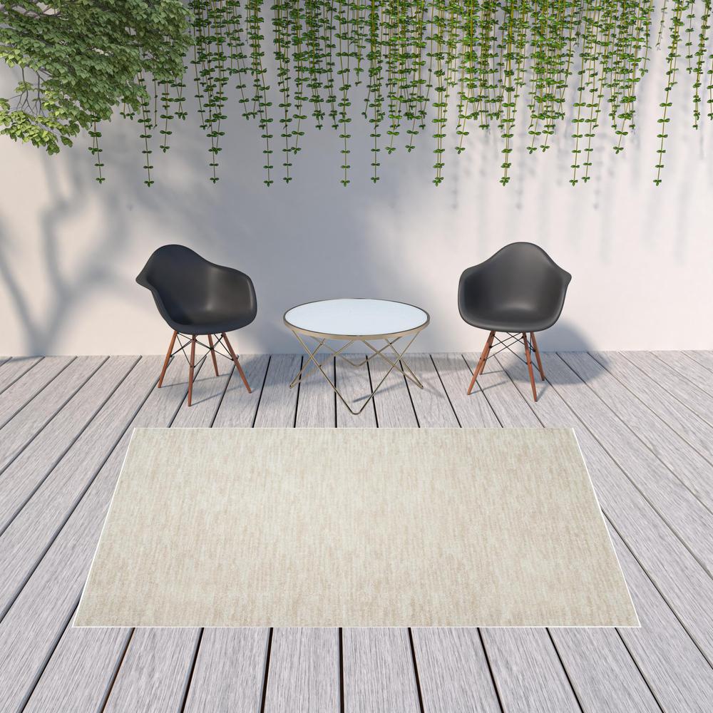 7' X 10' Ivory And Beige Non Skid Indoor Outdoor Area Rug. Picture 2