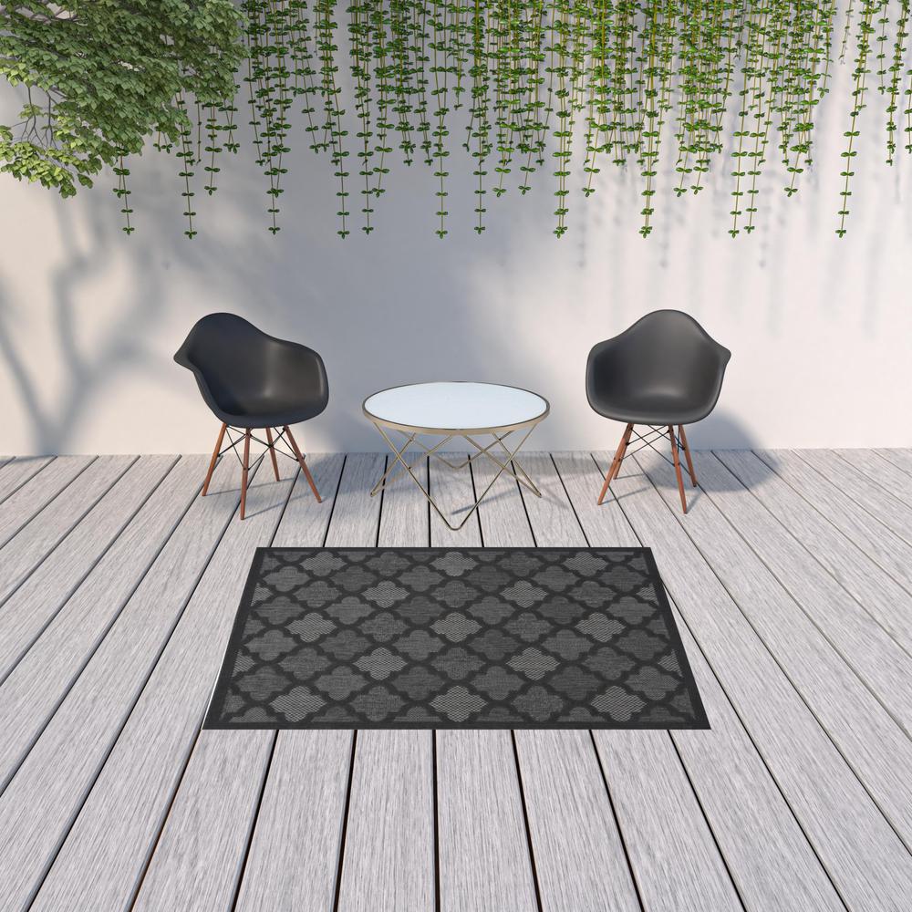 5' X 7' Charcoal Black Ikat Indoor Outdoor Area Rug. Picture 2