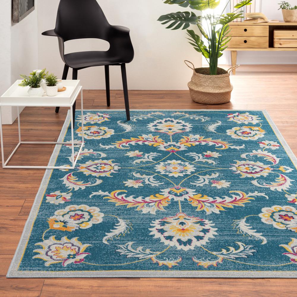 5' X 8' Blue And Ivory Floral Stain Resistant Indoor Outdoor Area Rug. Picture 7