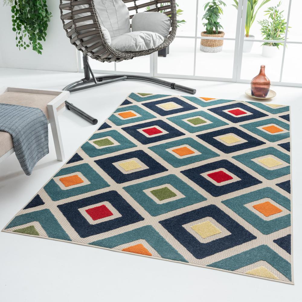 5' X 8' Blue And Ivory Geometric Stain Resistant Indoor Outdoor Area Rug. Picture 8