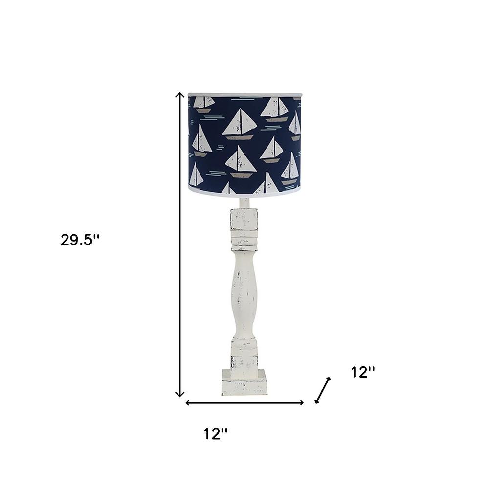 30" Distressed White Candlestick Table Lamp With Navy Sailboat Shade. Picture 8