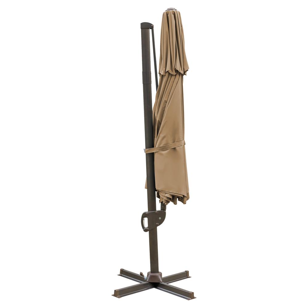 11.5' Tan Polyester Round Tilt Cantilever Patio Umbrella With Stand. Picture 1