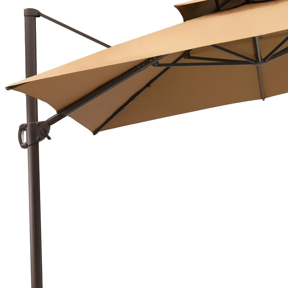 11' Tan Polyester Round Tilt Cantilever Patio Umbrella With Stand. Picture 4