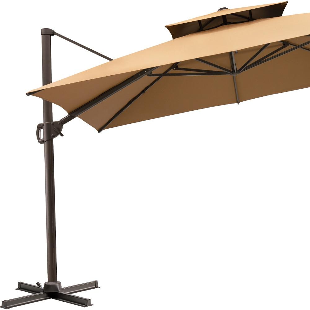 11' Tan Polyester Round Tilt Cantilever Patio Umbrella With Stand. Picture 1