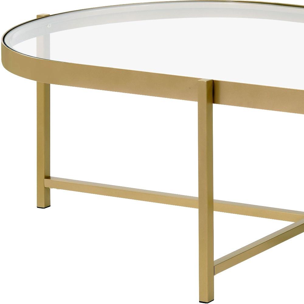 54" Gold And Clear Glass Oval Coffee Table. Picture 5
