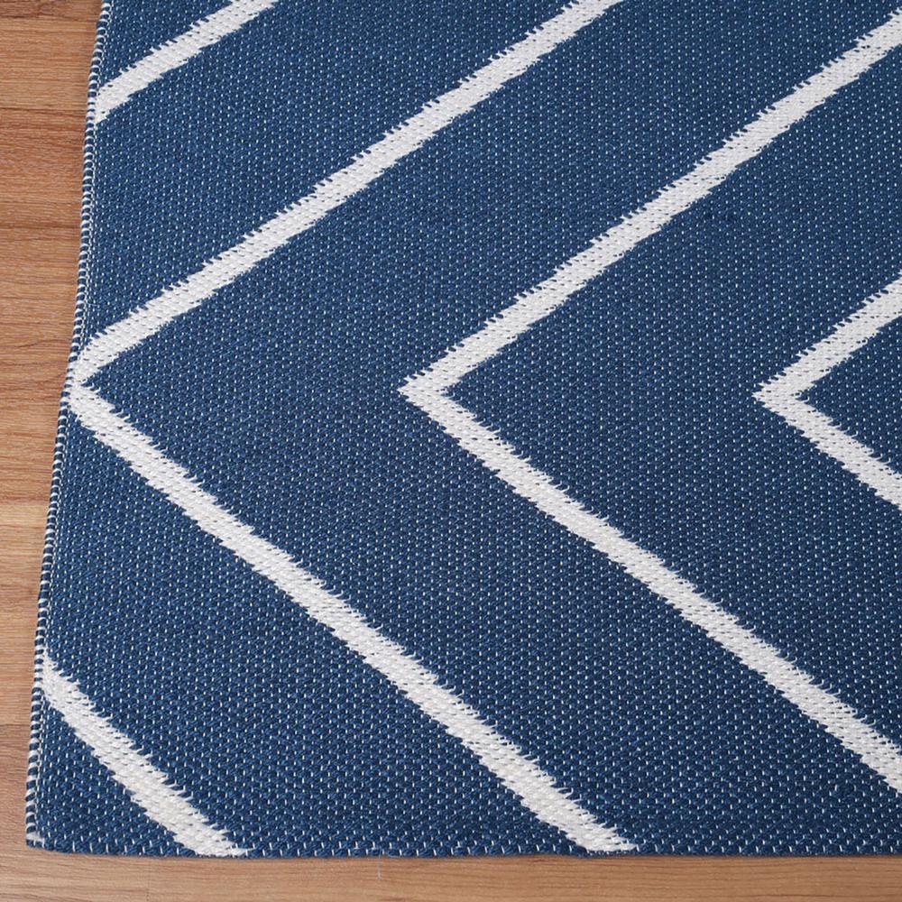 5' X 7' Navy Blue Waves Stain Resistant Indoor Outdoor Area Rug. Picture 9