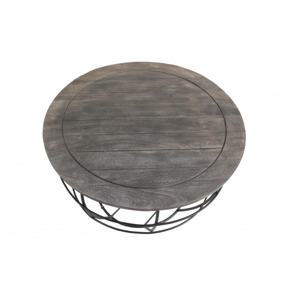 32" Gray Wash Solid Wood and Cast Iron Round Distressed Coffee Table. Picture 1