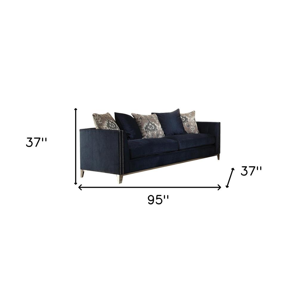 95" Blue Velvet And Black Sofa With Five Toss Pillows. Picture 6
