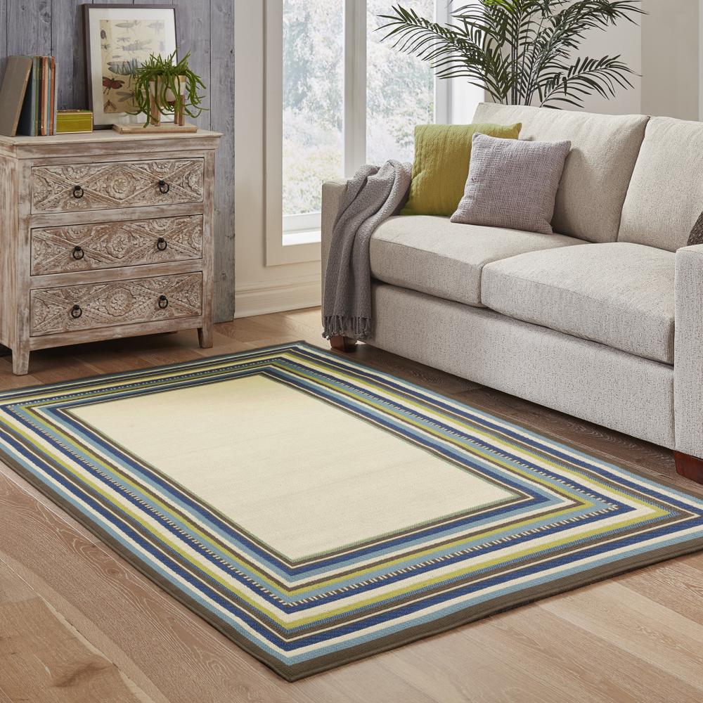 2' X 4' Ivory and Blue Striped Stain Resistant Indoor Outdoor Area Rug. Picture 8