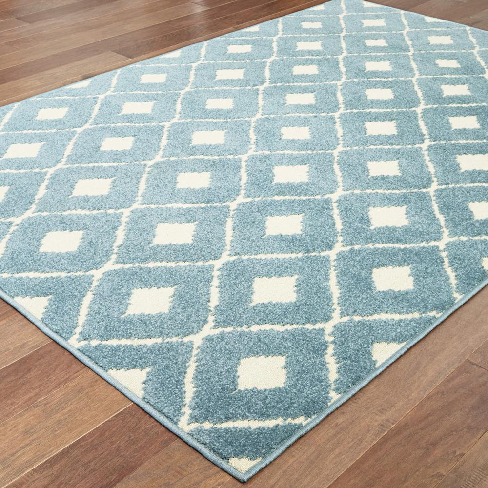 7' x 10' Blue and Ivory Geometric Stain Resistant Indoor Outdoor Area Rug. Picture 4